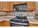 Kitchen stove with stainless steel oven and microwave at 3611 Owster Ln, Indianapolis, IN 46237