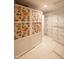 Spacious walk-in closet with custom shelving and decorative patterned panels at 3611 Owster Ln, Indianapolis, IN 46237
