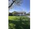 Charming single-story home with a well-maintained lawn and beautiful landscaping at 369 Northfield Dr, Mooresville, IN 46158