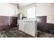 A laundry area with washer, dryer, and water heater at 3909 Aloda St, Indianapolis, IN 46203