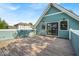 Large back deck overlooking the yard, perfect for outdoor entertaining and relaxation with great backyard views at 401 Sanders St, Indianapolis, IN 46225