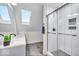 Modern bathroom featuring a glass-enclosed shower with tile accents and a stylish vanity at 401 Sanders St, Indianapolis, IN 46225