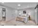Cozy bedroom with plush carpet, neutral walls, recessed lighting, and a comfortable queen bed at 401 Sanders St, Indianapolis, IN 46225