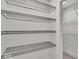 Walk-in closet with custom wire shelving, providing ample storage and organization solutions at 401 Sanders St, Indianapolis, IN 46225