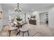 Spacious dining room leading to an open-concept kitchen and other rooms in the home at 401 Sanders St, Indianapolis, IN 46225