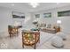 Bright living room featuring a fireplace, stylish seating, and a neutral color palette at 401 Sanders St, Indianapolis, IN 46225