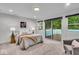 Inviting main bedroom with a large window and access to a private deck at 401 Sanders St, Indianapolis, IN 46225