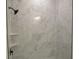 New shower featuring marble-look tiles and sleek hardware at 4230 Kingsley Dr, Indianapolis, IN 46205