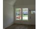 Bright living room with hardwood floors, white walls, and natural light at 4230 Kingsley Dr, Indianapolis, IN 46205