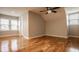 Bedroom featuring hardwood floors, a ceiling fan and lots of natural light at 4247 Central Ave, Indianapolis, IN 46205