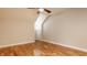 Bright bedroom featuring hardwood floors and a ceiling fan, perfect for restful nights at 4247 Central Ave, Indianapolis, IN 46205