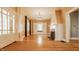 Spacious living room with hardwood floors, fireplace, and ample natural light at 4247 Central Ave, Indianapolis, IN 46205