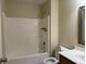 Full bath with standard shower-tub combo, white fixtures, and a wooden vanity for a functional layout at 4932 Tuscany Ln, Indianapolis, IN 46254