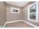 Neutral bedroom with two windows letting in plenty of natural light at 5074 E Walnut St, Indianapolis, IN 46201