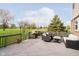 Outdoor deck featuring comfortable seating and a grill, perfect for enjoying the backyard view at 5196 E County Road 100 S, Avon, IN 46123