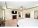 Large main bedroom showing access to walk-in closets and a TV at 5196 E County Road 100 S, Avon, IN 46123
