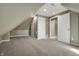 Finished attic bedroom with neutral paint and carpet at 5299 W Pr Black Hawk, Edinburgh, IN 46124