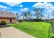 Large backyard with a fenced-in area, a shed, and a concrete patio, perfect for enjoying outdoor living at 5299 W Pr Black Hawk, Edinburgh, IN 46124