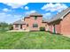 View of the backyard featuring a well-maintained lawn and a privacy fence at 5299 W Pr Black Hawk, Edinburgh, IN 46124