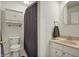 Bathroom with a toilet, sink, vanity, and shower with a curtain at 5299 W Pr Black Hawk, Edinburgh, IN 46124