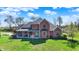 Elegant brick house with a welcoming porch, offering a blend of classic design and outdoor comfort at 5299 W Pr Black Hawk, Edinburgh, IN 46124