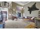 Open living area with high ceilings and stylish decor, creating an inviting and airy atmosphere at 5299 W Pr Black Hawk, Edinburgh, IN 46124