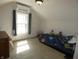 Bedroom featuring carpeted floors and a comfortable single bed near a window at 5331 N New Jersey St, Indianapolis, IN 46220