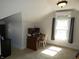 Bedroom features a wood desk, comfortable chair, and natural light at 5331 N New Jersey St, Indianapolis, IN 46220
