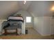 Cozy bedroom features a unique lofted bed and a bright window at 5331 N New Jersey St, Indianapolis, IN 46220