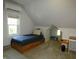 Bedroom featuring carpeted floors, comfortable single bed, and window at 5331 N New Jersey St, Indianapolis, IN 46220
