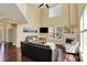 Bright and airy living room with high ceilings, a fireplace, and comfortable seating, ideal for relaxing and entertaining at 5549 Dill Ct, Indianapolis, IN 46237