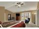 Serene main bedroom with vaulted ceilings, bay window, and neutral tones, creating a relaxing retreat at 5549 Dill Ct, Indianapolis, IN 46237