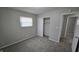 Bedroom featuring a closet and window that provides lots of light with carpet floors at 5636 W Henry St, Indianapolis, IN 46241