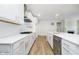 Spacious kitchen features a large island, stainless steel appliances, and modern design elements at 5661 Stetson Dr, Whitestown, IN 46052