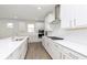 Bright, modern kitchen with white cabinets, stainless steel appliances, and a subway tile backsplash at 5661 Stetson Dr, Whitestown, IN 46052