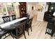 Dining room with wood floors, dining table, built in hutch and is located next to the kitchen at 601 E 95Th St, Indianapolis, IN 46240