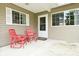 Inviting front porch with space for seating, creating a warm entrance to this comfortable home at 601 E 95Th St, Indianapolis, IN 46240
