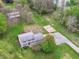 Expansive property features a well-maintained lawn, mature trees, and detached garage at 6113 N 250 E, Greenfield, IN 46140