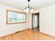 Bright dining area features hardwood floors, natural light and easy access to the outdoors at 6113 N 250 E, Greenfield, IN 46140