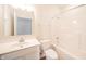 Well-lit bathroom with a vanity, toilet, and a shower-tub combo for everyday convenience at 6204 Fairview Dr, McCordsville, IN 46055