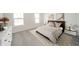 Inviting bedroom with natural light, stylish décor, and comfortable furnishings for relaxation at 6204 Fairview Dr, McCordsville, IN 46055