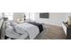Modern bedroom design featuring a comfortable bed, wooden floors, and stylish decor at 6204 Fairview Dr, McCordsville, IN 46055