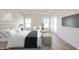 Modern bedroom with ample natural light, TV and comfortable bed at 6204 Fairview Dr, McCordsville, IN 46055