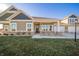 Charming single-story home with a covered entry, well-manicured lawn, and welcoming curb appeal at 6204 Fairview Dr, McCordsville, IN 46055
