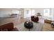 Stylish living room with modern furniture, wood-look floors, and bright, airy ambiance at 6204 Fairview Dr, McCordsville, IN 46055