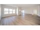 Bright open living space featuring beautiful wood-look flooring and lots of natural light at 6204 Fairview Dr, McCordsville, IN 46055