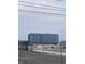 Modern office building with large windows and a sleek design under a cloudy sky at 644 Warren Ave, Indianapolis, IN 46221