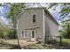 Exterior view of backyard featuring a wooden deck at 6534 Redland Way, Indianapolis, IN 46217