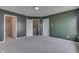 Spacious bedroom featuring neutral carpeting and multiple closets for ample storage at 6534 Redland Way, Indianapolis, IN 46217