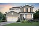 Charming two-story home featuring a two-car garage and beautifully landscaped front yard at 6801 Seabiscuit Rd, Whitestown, IN 46075